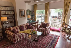 Living Area with the view of Balcony Prinsen apartment Amsterdam