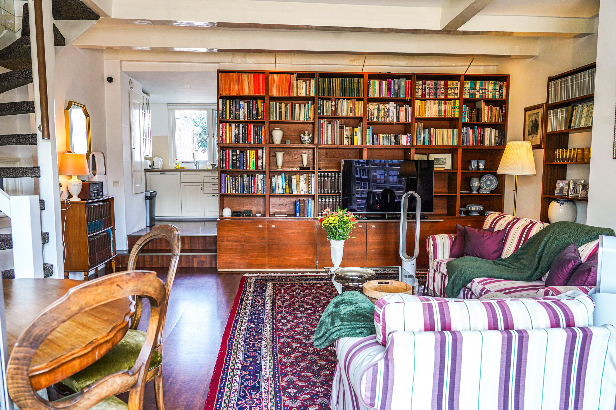 Living Area with Staircase and Kitchen View The Balcony at Prinsen Canal apartment Amsterdam