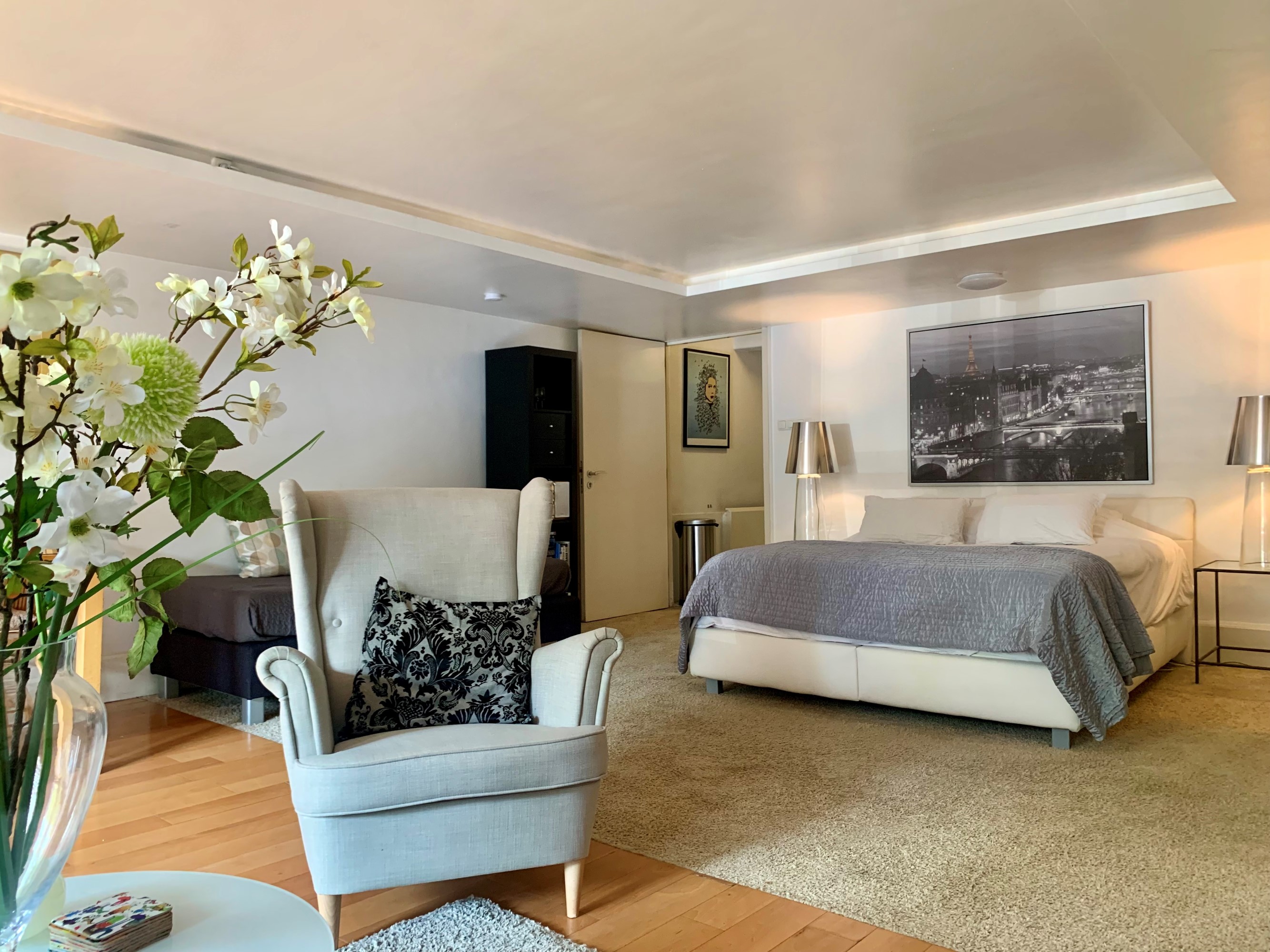 Sitting area with the view of bed Jordan Canal studio Amsterdam