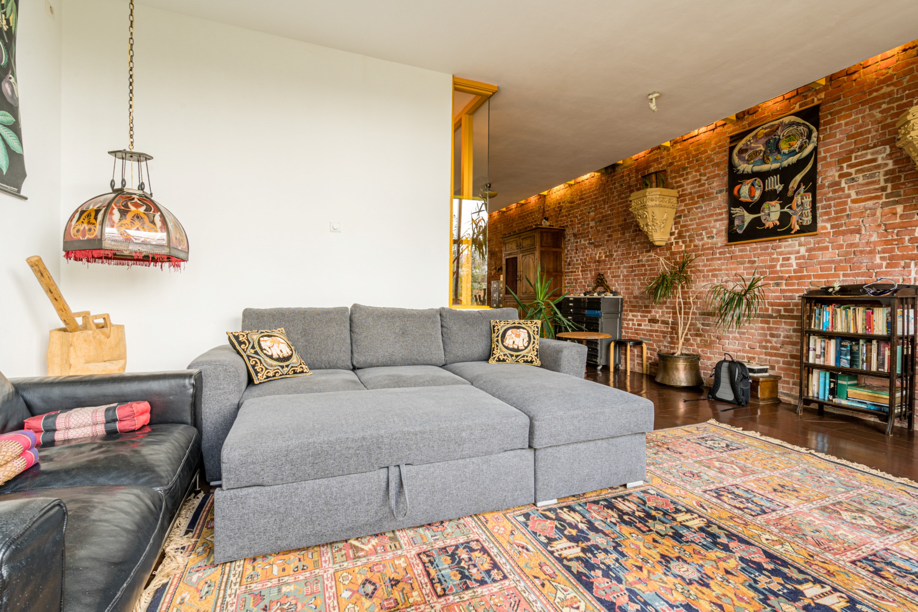Living area with sofa bed Hotspot Centrum apartment Groninge
